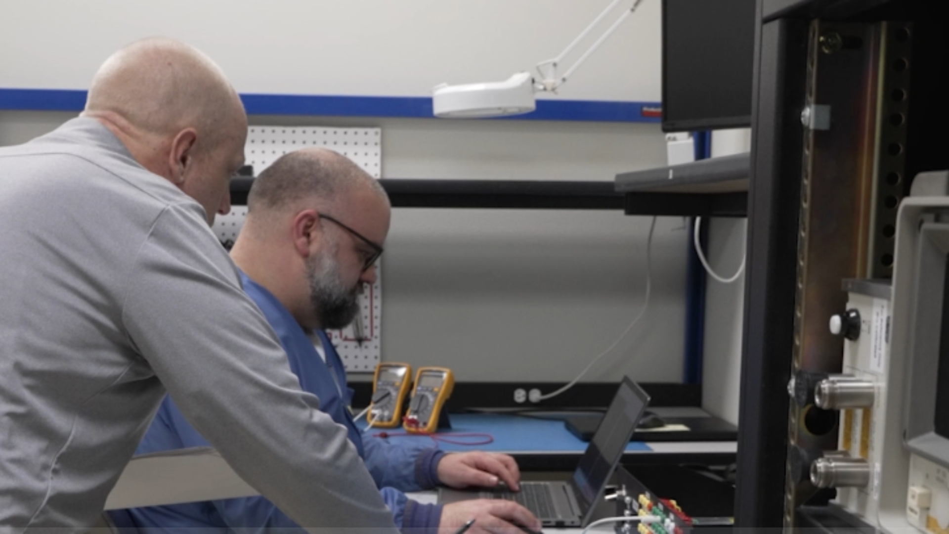 two engineers working on test